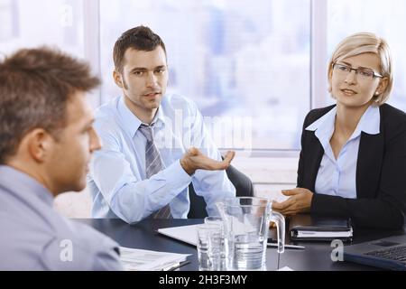 Professionals at discussion Stock Photo