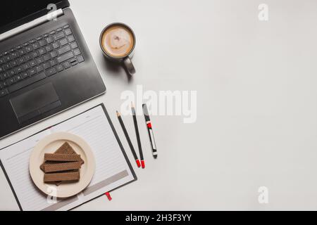 flat lay, books, stationery, coffee and gadgets Stock Photo