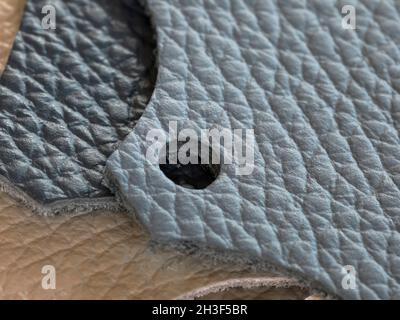 Natural leather upholstery samples are shown up close. Stock Photo