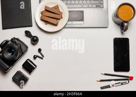 flat lay, in the middle empty with coffee and gadgets, to be productive, landscape Stock Photo