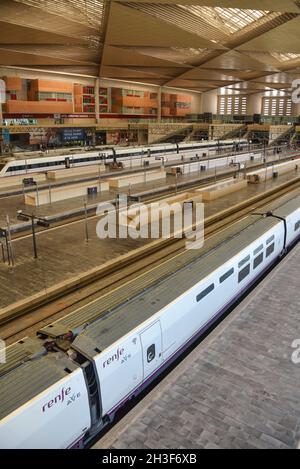 Zaragoza, Spain - Oct 23, 2021: Train platforms at Zaragoza Delicias Railway Station Stock Photo