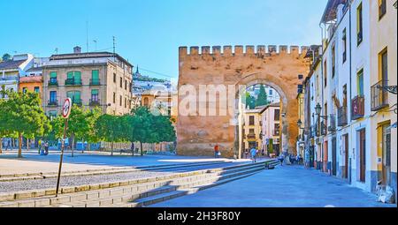 The medieval Puerta de Elvira (Elvira Gate), preserved since times of Arab rule, located in Triunfo (Triumph) Square, it's the main entrance to histor Stock Photo