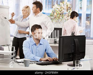 Office life - business people working Stock Photo