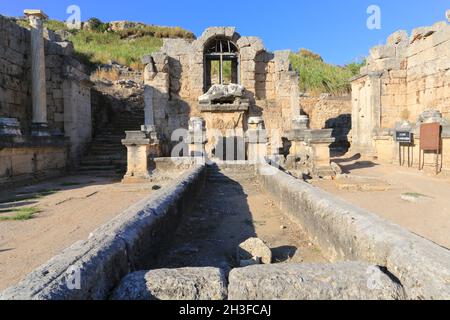 Nymphaeum and the water canal, built during the Roman period, at the ancient Greek city of Perge (Perga) in the Anatolia region of Turkey. Stock Photo