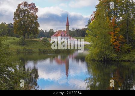 Ancient suburban Priorat Palace in the autumn landscape. Gatchina. Leningrad region, Russia Stock Photo