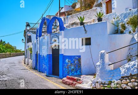 GRANADA, SPAIN - SEPT 27, 2019:  Flamenco Theater Cuevas La Faraona (Caves) is the small colorful building in Sacromonte, attracting with zambra Flame Stock Photo