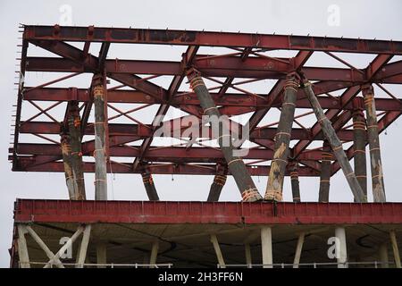 Deserted pavilion from the Netherlands on former world expo 2000 in Hannover, Germany. Massive wooden trunks that supported a heavy concrete ceiling. Stock Photo