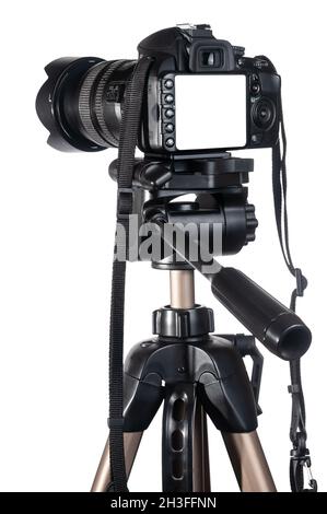 Modern DSLR camera on tripod isolated on white background Stock Photo