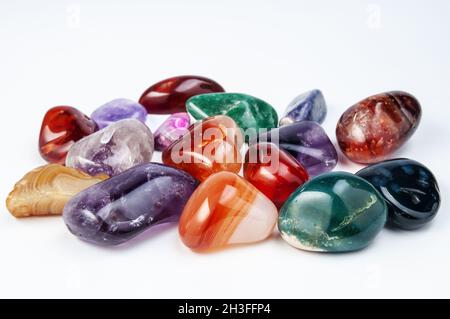 different colorful Semi Precious stones on white background Stock Photo