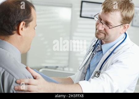 Doctor telling bad news Stock Photo