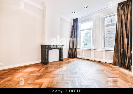 Amazing bright living room with black fireplace Stock Photo