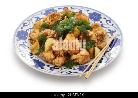 taiwanese popcorn chicken with fried basil, and you can usually choose other ingredients to get deep fried, and mixed together, like garlic, basil, br Stock Photo