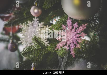 rich and elegant christmas adornments and decoration on tree Stock Photo