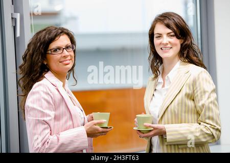 Businesswomen drinking coffee Stock Photo
