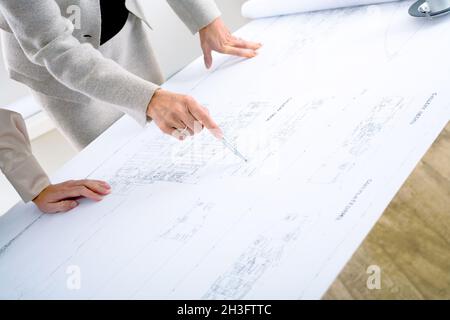 Architects planning on blueprint Stock Photo