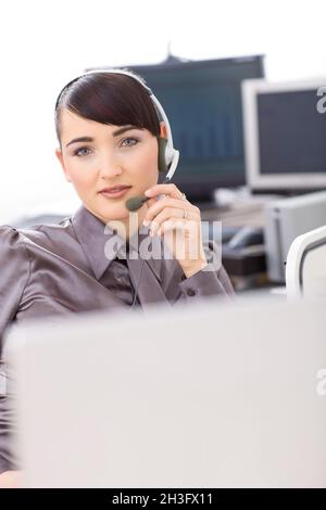 Operator talking on headset Stock Photo
