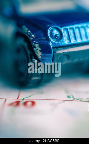 Toy car on a road map Stock Photo