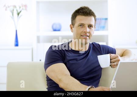 Man drinking coffee Stock Photo
