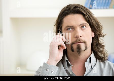 Man talking on mobile Stock Photo