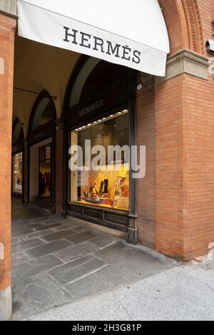 Bologna Italy. October 2021.  the shop windows of the Hermes brand under a portico in the city center Stock Photo
