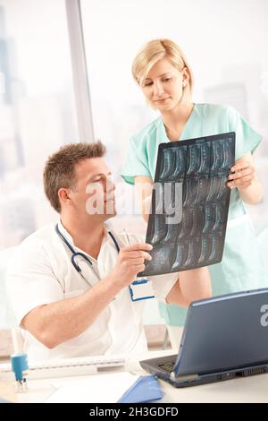 Doctor and nurse with x-ray image Stock Photo