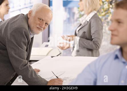 Senior designer at work Stock Photo