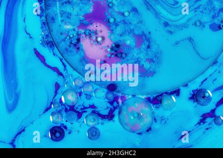 Oil mixed with paint form an abstract image. Stock Photo