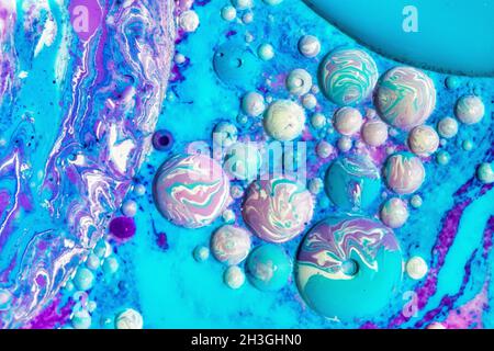 Oil mixed with paint form an abstract image. Stock Photo