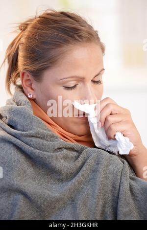Young woman caught cold feeling bad