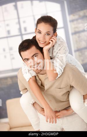 Happy young couple having fun at home Stock Photo