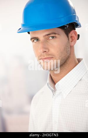 Portrait of goodlooking young man in helmet Stock Photo