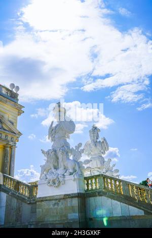 Vienna Austria - September 4 2017; Imposing white marble sculpture of soldier above the Gloriette balustrade against clear blue sky Stock Photo