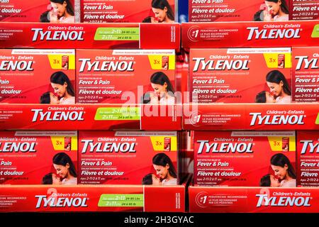 Toronto, Ontario, Canada-October 20, 2019: Boxes of Tylenol in a pharmacy shelf. The product has a good demand in most Canadian stores. Stock Photo