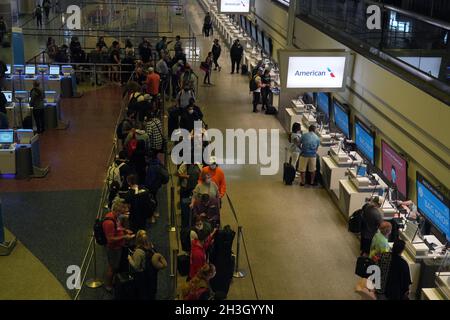 Passengers at an American Airlines ticket counter at the McCarran International Airport (Harry Reid International Airport), Monday, Oct. 25, 2021, in Las Vegas. Stock Photo