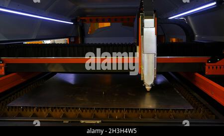 Cutting of metal. Media. Sparks fly from laser. CNC Laser cutting of metal, modern industrial technology Stock Photo