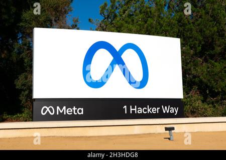Meta logo, sign in front of Meta Platforms headquarters. Meta Platforms is the parent organization of Facebook, Instagram, and WhatsApp.