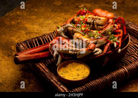 Delicious fresh and cooked whole crab with brazilian farofa. High quality photo Stock Photo