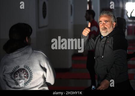 A senior man giving a thumbs up sign Stock Photo