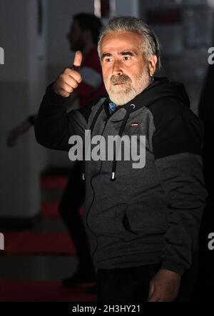 A senior man giving a thumbs up sign Stock Photo