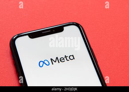 Milan, Italy - 28 October 2021: The Meta logo, the rebranded name from the formerly known company called Facebook, is seen on the display of an Apple Stock Photo