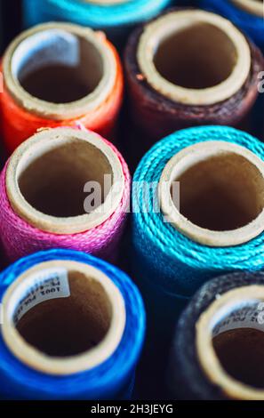 Sewing threads multicolored background closeup texture Stock Photo