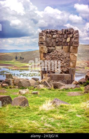 Sillustani - pre-Incan burial ground (tombs) on the shores of Lake Umayo near Puno, in Peru Stock Photo