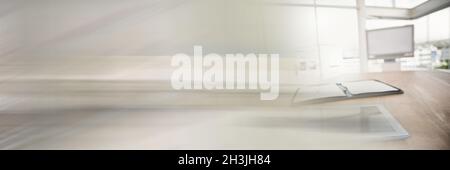 Digital tablet computer with open diary on desk in bright empty office by blurred effect Stock Photo