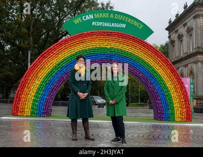 EDITORIAL USE ONLY (left to Right) Alison Thewliss, MP for Glasgow Central, and Councillor Anna Richardson, City Convener for Sustainability and Carbon Reduction at Glasgow City Council, infront a 4x7 metre rainbow arch, created from recycled aluminium cans, which has been installed by recycling initiative 'Every Can Counts' in partnership with Glasgow City Council, at Shawlands Civic Square, Scotland to remind people of the importance of recycling empty drink cans ahead of Cop26. Picture date: Friday October 29, 2021. Stock Photo