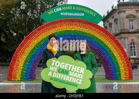 EDITORIAL USE ONLY (Left to Right) Alison Thewliss, MP for Glasgow Central, and Councillor Anna Richardson, City Convener for Sustainability and Carbon Reduction at Glasgow City Council, infront a 4x7 metre rainbow arch, created from recycled aluminium cans, which has been installed by recycling initiative 'Every Can Counts' in partnership with Glasgow City Council, at Shawlands Civic Square, Scotland to remind people of the importance of recycling empty drink cans ahead of Cop26. Picture date: Friday October 29, 2021. Stock Photo