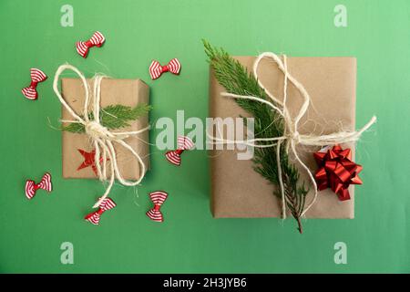 Christmas gift box, two christmas gift boxes on green background, top view concept photo Stock Photo