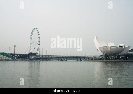 View of Art Science Museum and Ferris Wheel in Singapore Stock Photo