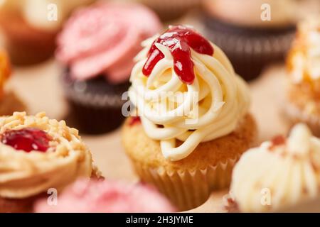 Cupcake with spaghetti ice cream topping as a decoration for a children's birthday party Stock Photo