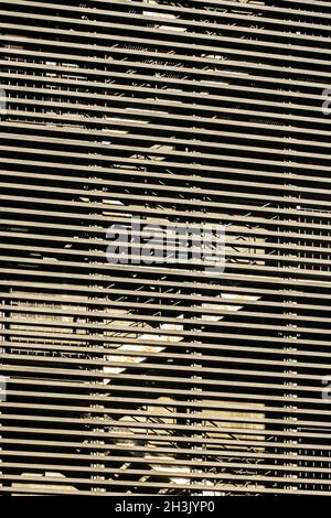 Outline of stairs behind slatted wall of modern building - Tours, Indre-et-Loire (37), France. Stock Photo