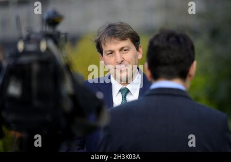 John Glen MP (Conservative: Salisbury) Economic Secretary to the Treasury and City Minister, being interviewed on College Green, Westminster after the Stock Photo
